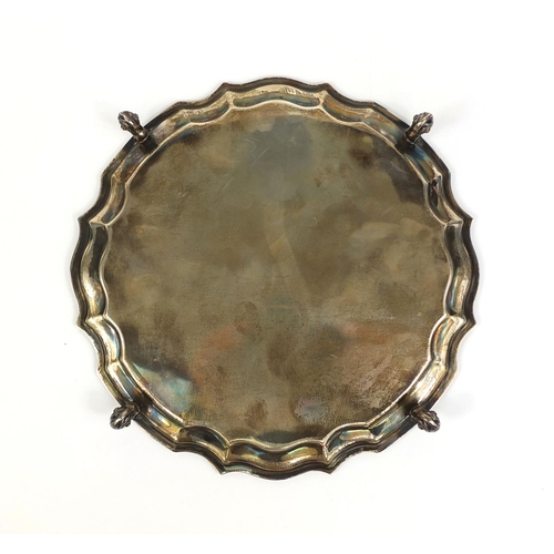 667 - Circular silver four footed salver, J.T & Co Sheffield 1968, 20.5cm in diameter, approximate weight ... 