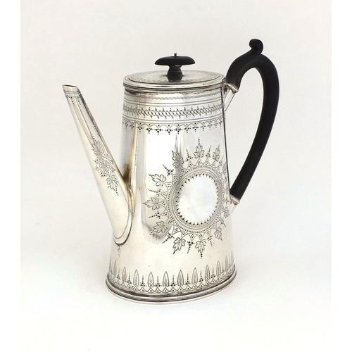 663 - Victorian silver coffeepot with engraved floral decoration and ebonised wood handle and knop, WBJ Lo... 