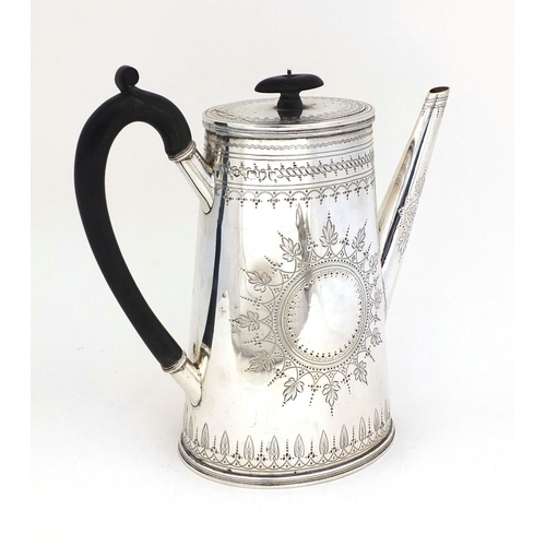 663 - Victorian silver coffeepot with engraved floral decoration and ebonised wood handle and knop, WBJ Lo... 