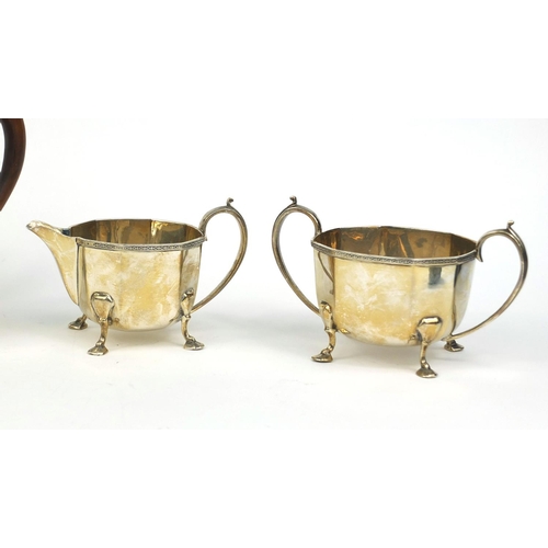 654 - Art Deco silver four piece tea and coffee service, indistinct makers mark Sheffield 1929, the coffee... 