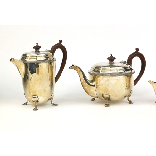 654 - Art Deco silver four piece tea and coffee service, indistinct makers mark Sheffield 1929, the coffee... 