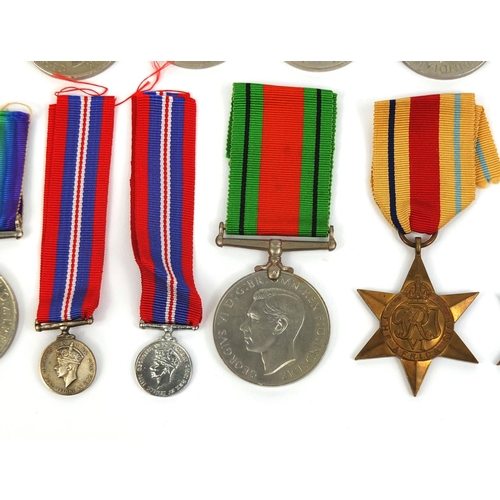 275 - Collection of British Military interest World War II medals including 1939-45 defence medal and the ... 