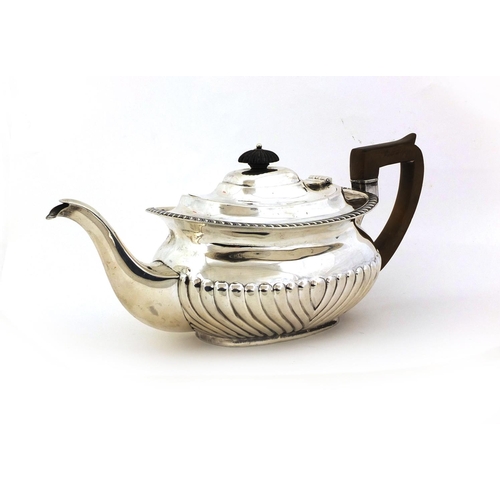 670 - Silver teapot with embossed demi fluted decoration, J.H & Co Sheffield 1900, 30cm long, approximate ... 