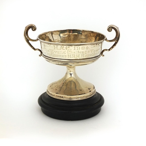 688 - Silver twin handled trophy engraved The Evans Challenge Vase 1904, raised on a wooden base, HM Birmi... 