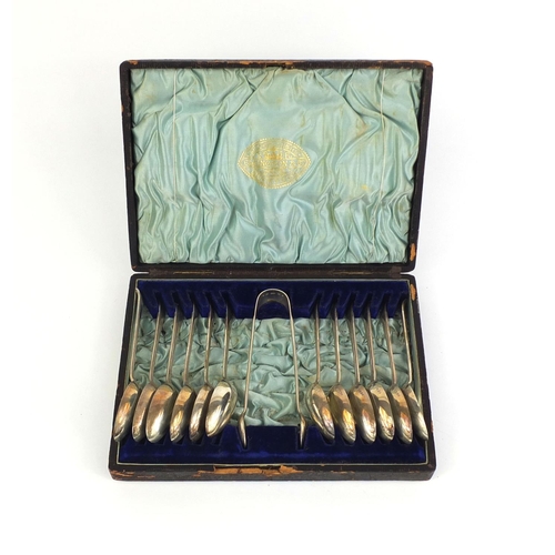 725 - Cased set of twelve Victorian silver spoons and sugar tongs, FE Birmingham 1888, the sugar tongs 15c... 