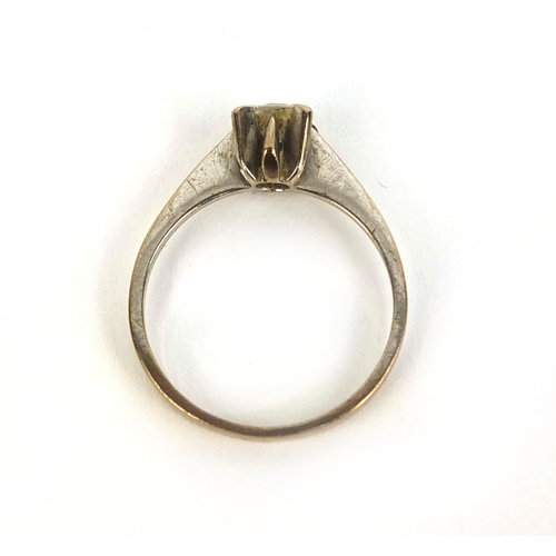 803 - Unmarked white metal diamond solitaire ring, size M, approximate weight 2.5g