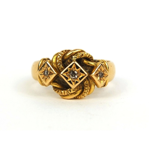 799 - 18ct gold diamond knot ring set with three diamonds, size N, approximate weight 7.2g