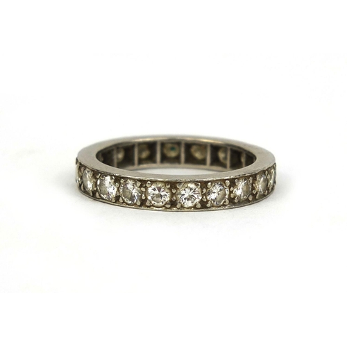 783 - Platinum and diamond eternity ring set with twenty solitaire diamonds, size N, approximate weight 5.... 