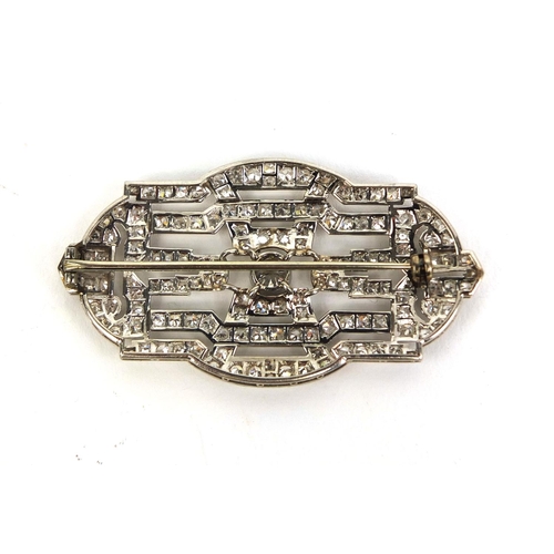 756 - Art Deco Unmarked white metal diamond brooch, set with approximately one hundred stones,  5.5cm long... 