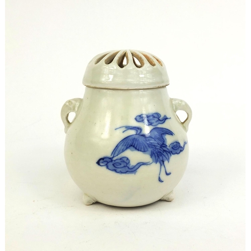 428 - Japanese hirado porcelain twin handled incense burner and cover, hand painted with cranes amongst cl... 