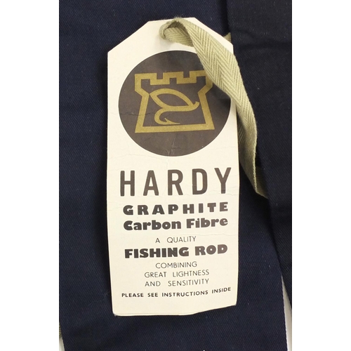 120 - Four Hardy carbon graphite fishing rods all with cloth cases and two spare cases