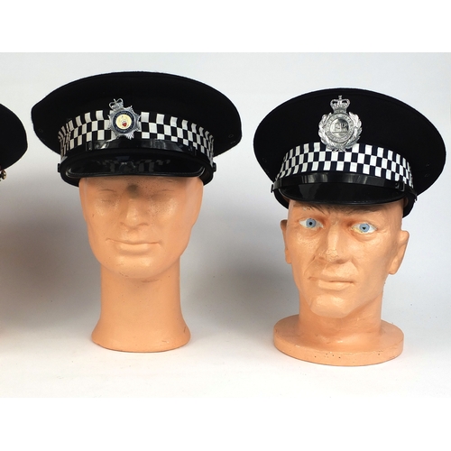 336 - Group of four vintage police Peak Caps, comprising Humberside police, City of London police, North W... 