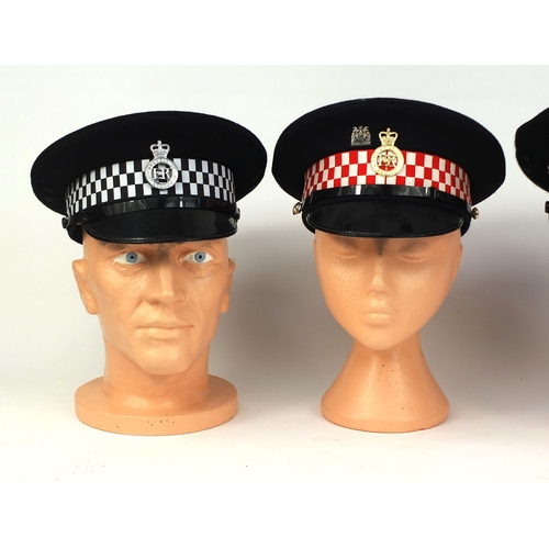 336 - Group of four vintage police Peak Caps, comprising Humberside police, City of London police, North W... 