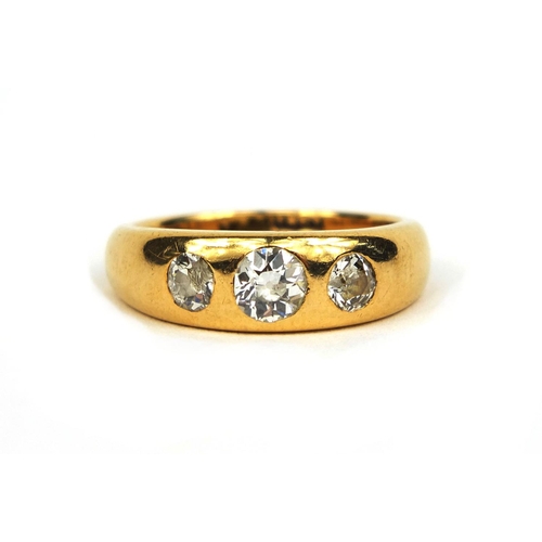 797 - 18ct gold diamond three stone gypsy ring, size Q, approximate weight 8.2g