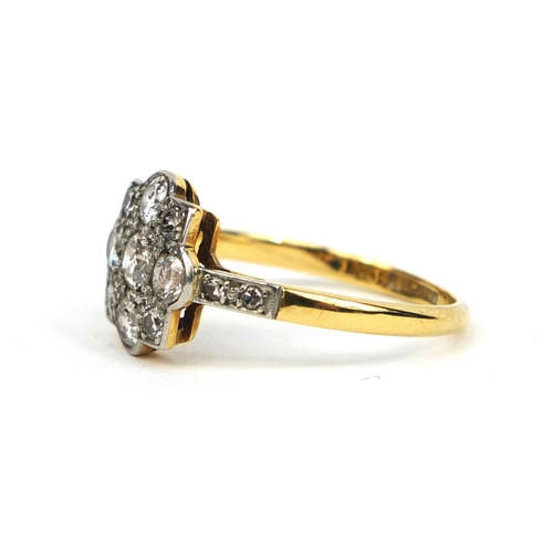 793 - 18ct gold diamond cluster ring set with thirteen solitaire diamonds, size O, approximate weight 2.9g