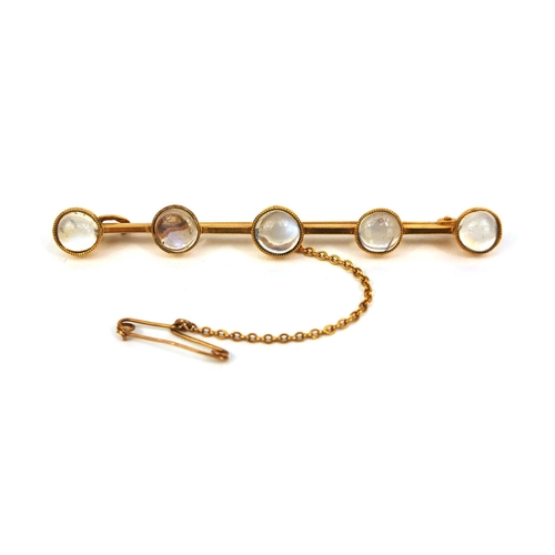 806 - Unmarked gold cabochon moonstone bar brooch, 6.5cm long, approximate weight 4.0g