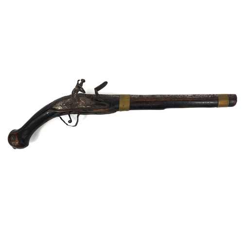 310 - Antique flint lock pistol, probably Turkish, 49cm long