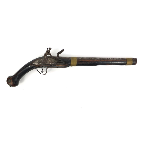 310 - Antique flint lock pistol, probably Turkish, 49cm long