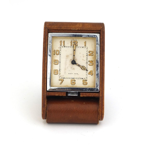 748 - Vintage Le Coultre leather cased chrome travelling clock with eight day movement and luminous hands,... 