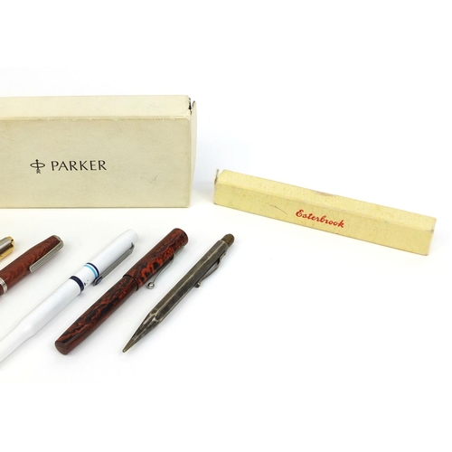 71 - Group of vintage fountain pens and propelling pencils, including a brown ripple Blackbird self fille... 