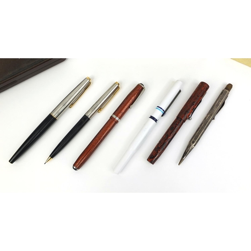 71 - Group of vintage fountain pens and propelling pencils, including a brown ripple Blackbird self fille... 