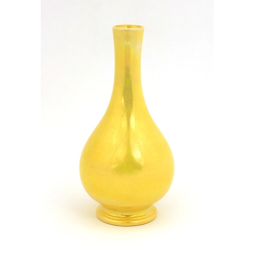 623 - Moorcroft pottery high fired yellow glazed bottle vase, factory marks to the base, 15cm high