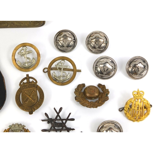 280 - Collection of British Military Naval interest cap badges and pips, together with a Christmas 1914 br... 