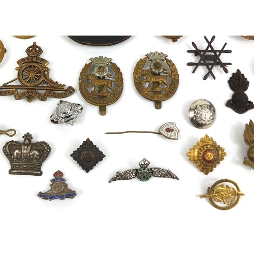 280 - Collection of British Military Naval interest cap badges and pips, together with a Christmas 1914 br... 