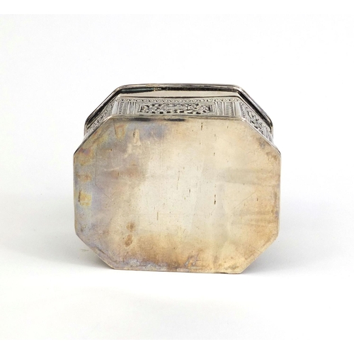 513 - Octagonal Indian unmarked silver box with lift off lid and pierced floral decoration, 6.5cm high x 8... 