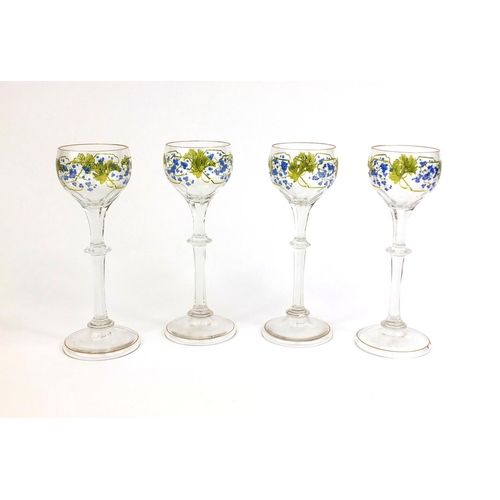 571 - Set of four German Theresienthal glasses, hand painted with fruiting vines, each 21.5cm high