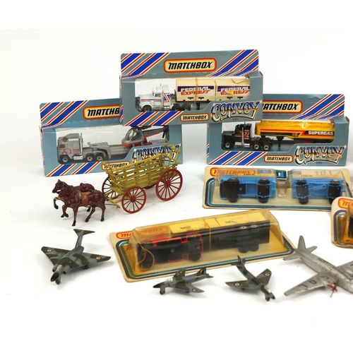 250 - Collection of vintage toys comprising two hand painted lead horse drawn carriages, two Dinky die cas... 