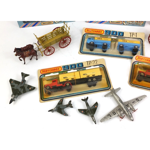 250 - Collection of vintage toys comprising two hand painted lead horse drawn carriages, two Dinky die cas... 