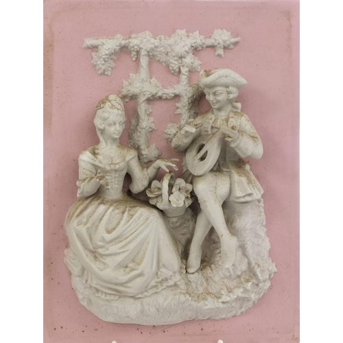 559 - Pair of continental relief moulded bisque plaques of courting couples, each 25.5cm x 19.5cm