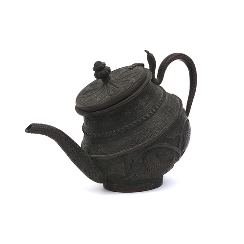 518 - Middle Eastern bronzed teapot with serpent handle profusely decorated with flowers and foliage, 14cm... 