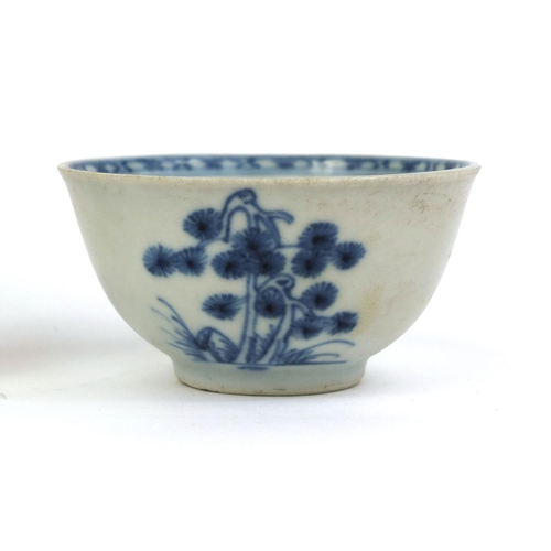 414 - Chinese Nanking Cargo blue and white porcelain tea bowl and saucer, each with Christies lot label to... 