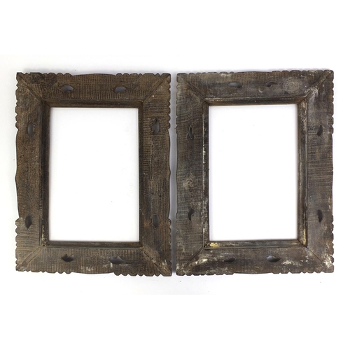 109 - Pair of rectangular hardwood frames carved with foliage, each 44cm x 33.5cm