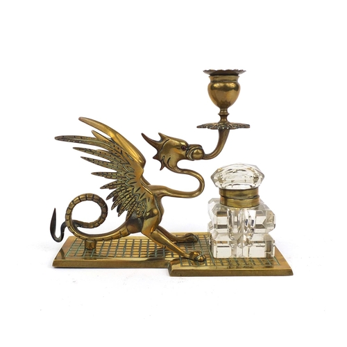 12 - Victorian brass candlestick desk stand, in the form of a dragon with glass inkwell, 18.5cm high