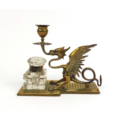 12 - Victorian brass candlestick desk stand, in the form of a dragon with glass inkwell, 18.5cm high