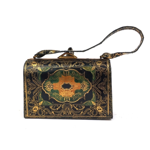 47 - Vintage tooled leather ladies evening bag with floral decoration, 17cm wide