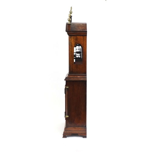 735 - Inlaid mahogany shelf clock with carved fretwork and brass urn shaped finials, the painted dial insc... 