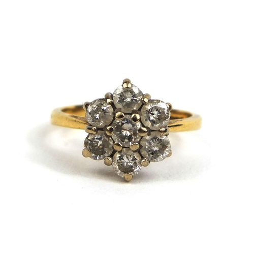 801 - 18ct gold diamond flower head ring set with seven solitaire diamonds, size J, approximate weight 3.6... 