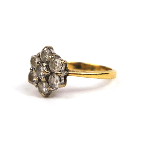 801 - 18ct gold diamond flower head ring set with seven solitaire diamonds, size J, approximate weight 3.6... 