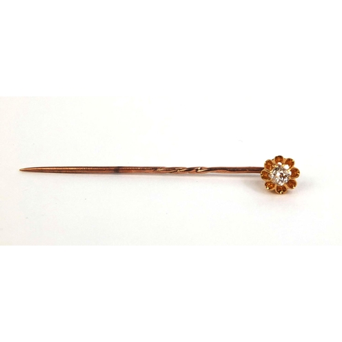 827 - Unmarked gold diamond solitaire tie pin, 5.5cm long, approximate weight 1.8g