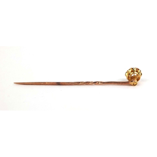 827 - Unmarked gold diamond solitaire tie pin, 5.5cm long, approximate weight 1.8g