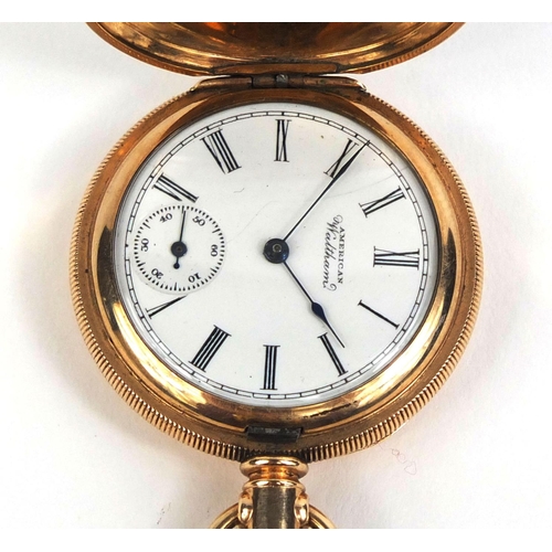 880 - Ladies gold plated full hunter pocket watch with engine turned decoration, 3.5cm in diameter, approx... 