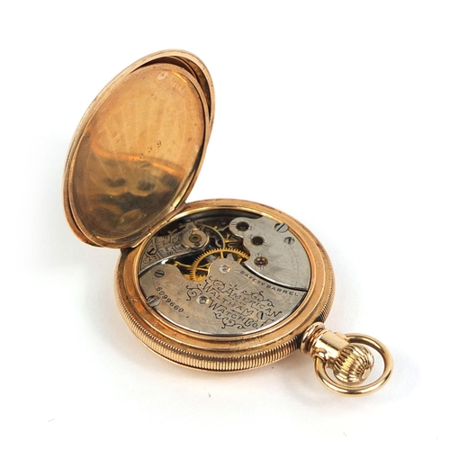 880 - Ladies gold plated full hunter pocket watch with engine turned decoration, 3.5cm in diameter, approx... 