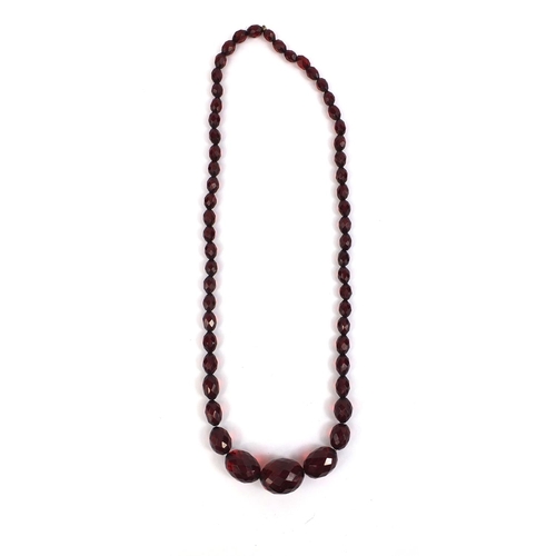 848 - Faceted cherry amber coloured bead necklace, 60cm long, approximate weight 36.5g