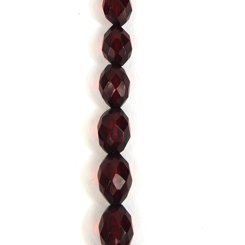 848 - Faceted cherry amber coloured bead necklace, 60cm long, approximate weight 36.5g