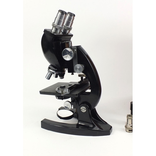 31 - US Bausch & Lomb adjustable microscope with lenses, housed in a fitted box, impressed CL2550, the mi... 