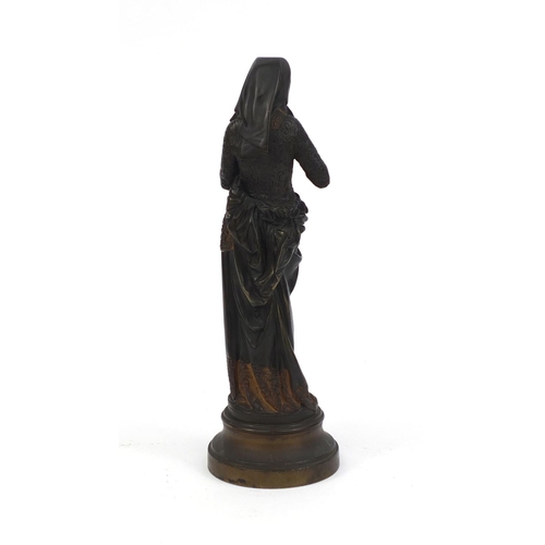 5 - Albert Ernest Carryer Belleuse, bronze and ivory study 'Liseuse' raised on a shaped base with plaque... 